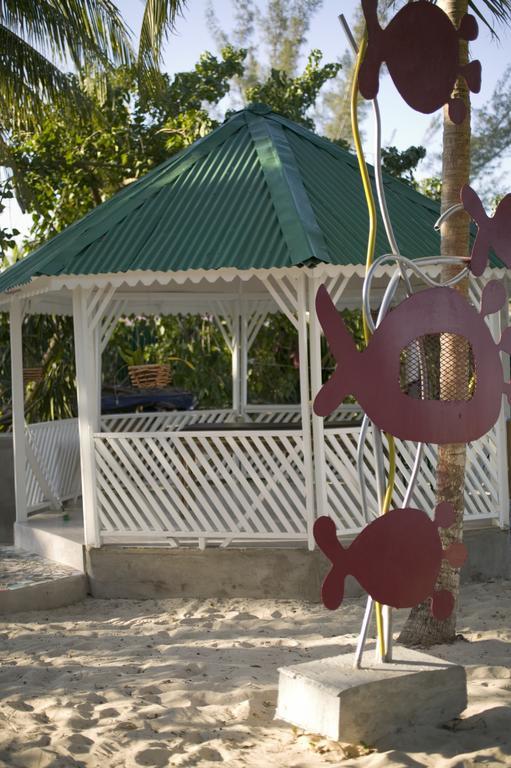 Whistling Bird Hotel Negril Esterno foto
